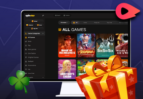 A desktop is displaying Spinstar's game page, a clove, a turbo symbol, and a giftbox, all on a dark blue background.